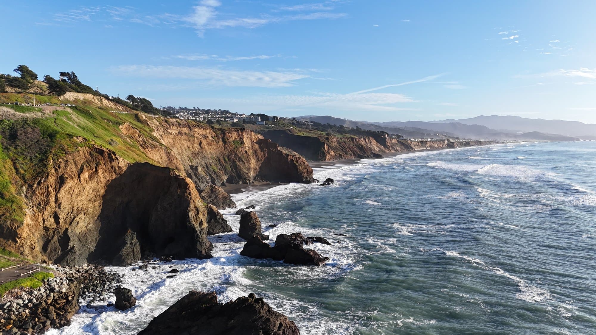 Pacifica coastal cliffs and sea stacks at golden hour