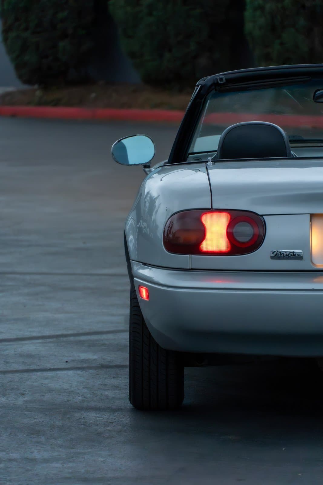 Automotive commercial photography — a Mazda Miata at dusk.