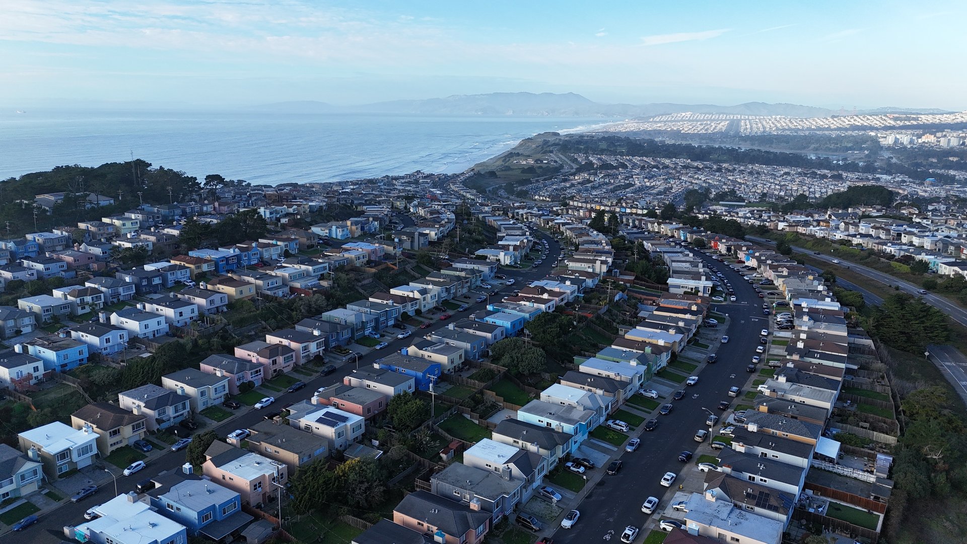 A coastal neighborhood photographed from the air for a listing