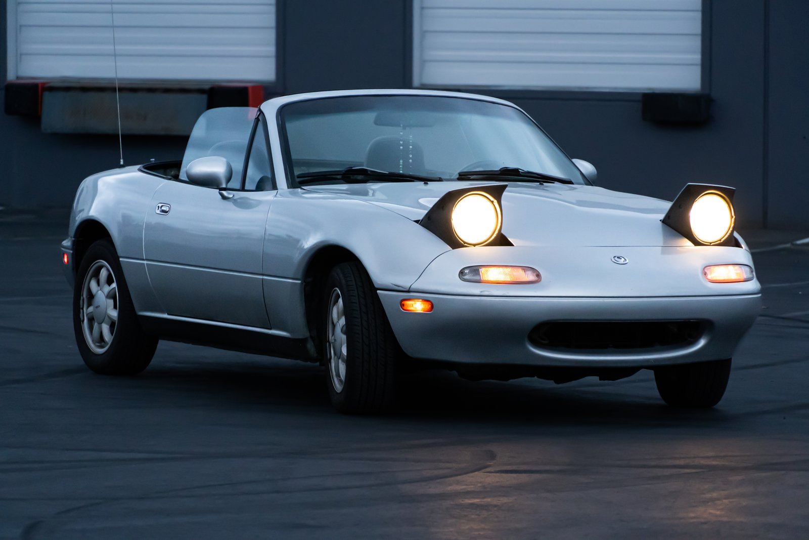 A Mazda Miata photographed head-on for an automotive shoot